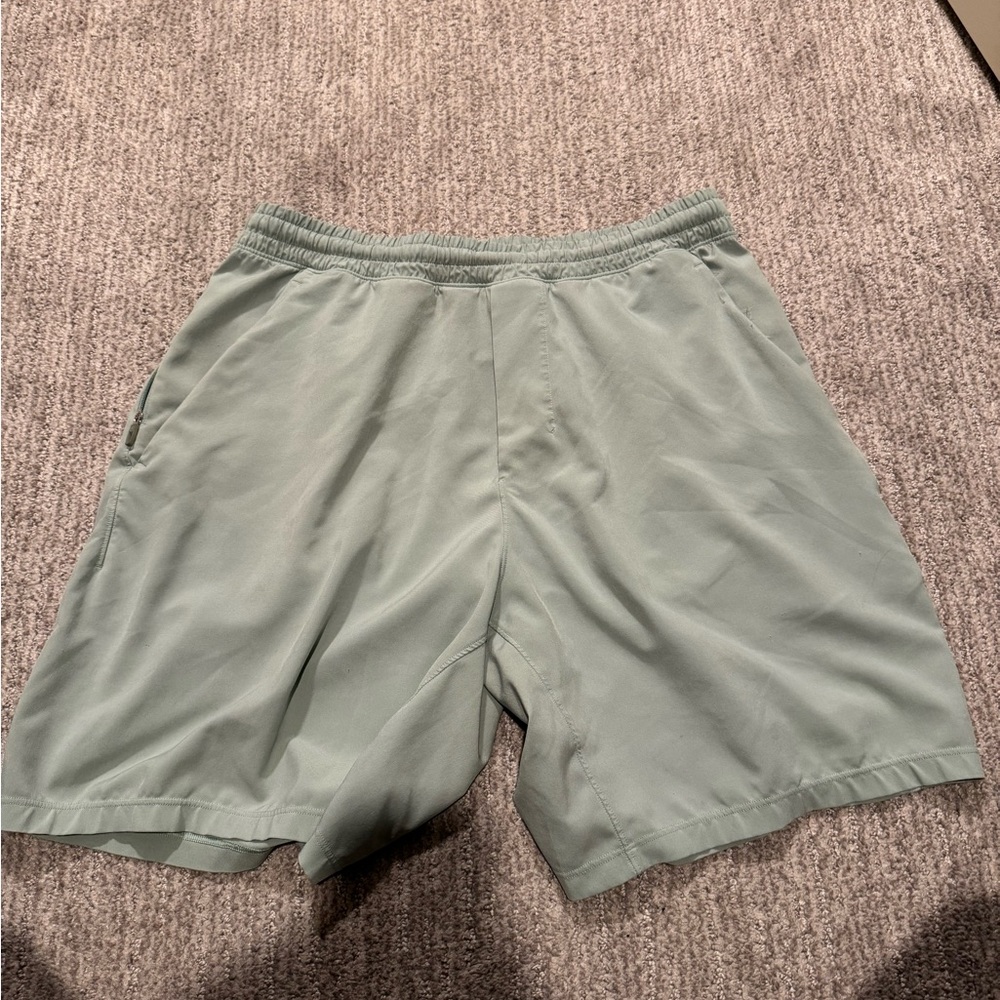 Men's Lululemon Pace Breaker Light Green Shorts 7 inch inseam
